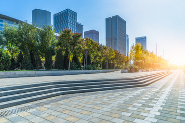 Obraz premium modern buildings and empty pavement in china..