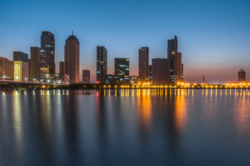 Tianjin city waterfront downtown skyline at dusk,China.