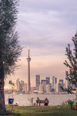 Fototapeta premium View of Toronto city during sunset from Toronto Central Island