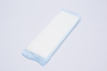 Disposable Pregnancy Or Maternity Pad Over White Background