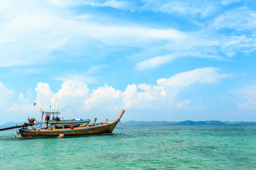 Fototapeta premium Longtail boats floating on the Sea at Phuket, Thailand. Summer, Travel, Vacation and Holiday concept.
