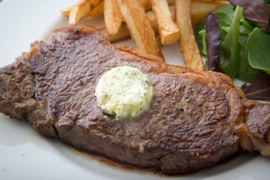 NY strip steak with garlic herb butter