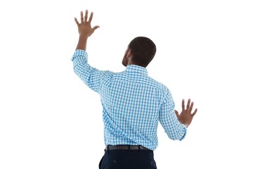 Male executive pretending to use an invisible screen