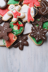 Mixed christmas cookies with place for your text on wooden table