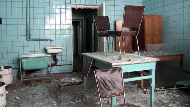 Canteen dining room in Pyramiden Spitsbergen Arctic. Russian neglected township. Canned place times of Soviet Union. Time stood still of North Pole.