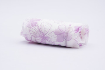 Used Disposable Sanitary Pads Over White Background