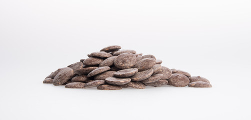 Chocolate or chocolate pile on a background.
