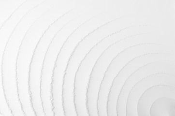 White abstract soft smooth semi circle lines plaster background.