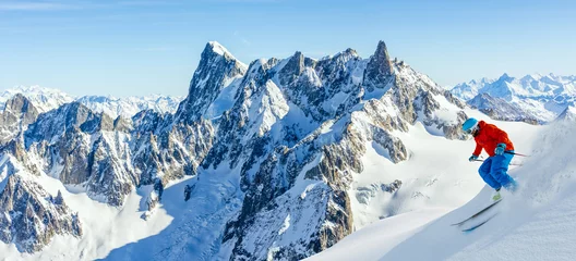 Papier Peint photo Mont Blanc Skiing Vallee Blanche Chamonix with amazing panorama of Grandes Jorasses and Dent du Geant from Aiguille du Midi, Mont Blanc mountain, Haute-Savoie, France