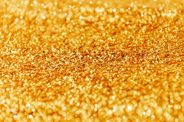 gold color glitter texture and bokeh light for christmas, new year festival abstract background