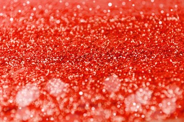 red color glitter texture and bokeh light for christmas, new year festival abstract background