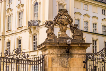 Fototapeta na wymiar Decorative sculptural elements of the facade of a government building in Prague, Czech Republic