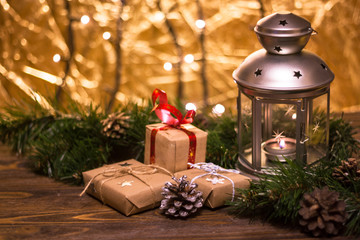 Burning lantern and christmas decoration on white background