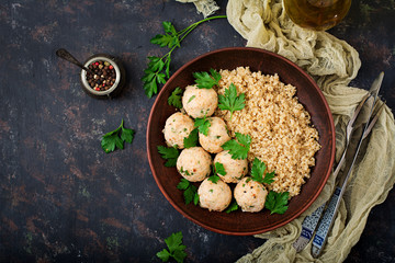 Baked meatballs of chicken fillet with garnished with quinoa. Flat lay. Top view. Proper nutrition. Sports nutrition. Dietary menu