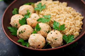 Baked meatballs of chicken fillet with garnished with quinoa. Flat lay. Top view. Proper nutrition. Sports nutrition. Dietary menu