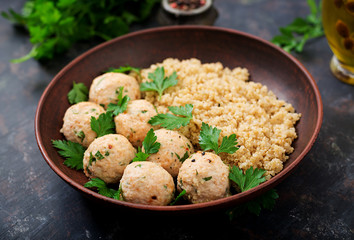 Baked meatballs of chicken fillet with garnished with quinoa. Flat lay. Top view. Proper nutrition. Sports nutrition. Dietary menu