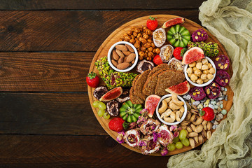 Mix fruits and nuts, healthy diet, Turkish sweets, eating lean. Flat lay. Top view