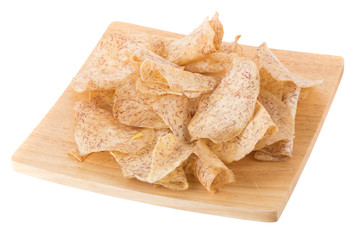 fried Taro slices Dip into the caramel In a wooden tray isolated on white background