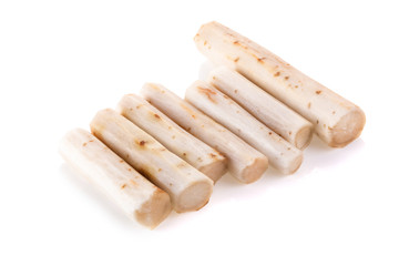 Fresh Burdock roots isolated on white background
