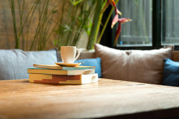 Stack of book with coffee cup
