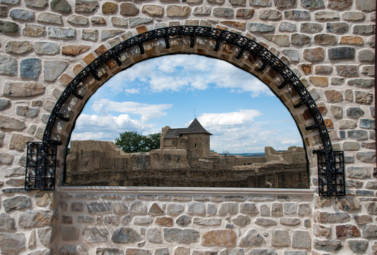Stone medieval window overlooking the Fortress of the Suceava city, from Romania