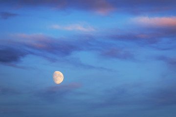 Moon over the blue sky