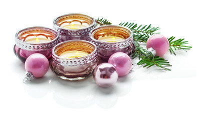 Christmas decoration with candles and balls, isolated on white