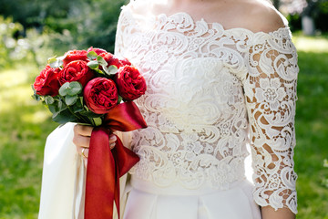Bride with bouquet, closeup