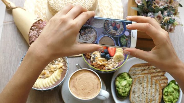 Woman Hands Taking Photo Of Trendy Breakfast With Smartphone. Closeup. 4K. 