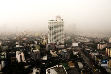 Fototapeta premium Heavy rain and stoom over tall building bangkok city