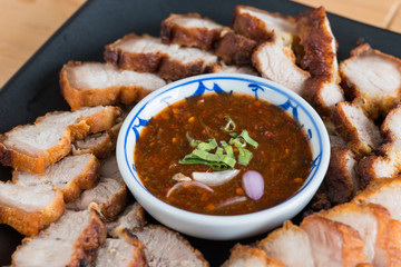 Deep Fried Crispy Pork Belly Cooked with Garlic and spicy dipping sauce
