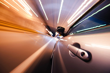 Car on the road with motion blur background.