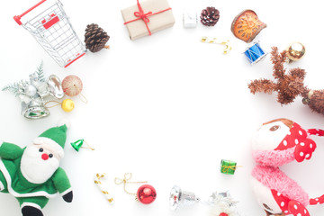 Creative flat lay of Christmas ornaments and decorations on white background