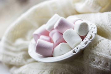 Marshmallows with a couple of christmas coffee cups