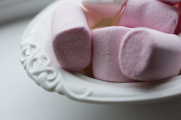 Marshmallows with a couple of christmas coffee cups