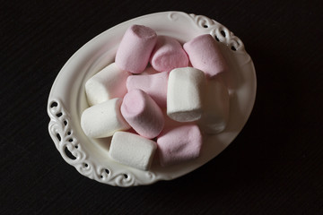 Marshmallows with a couple of christmas coffee cups