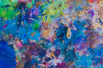 Abstract colorful stains of oil paint on canvas, background, texture