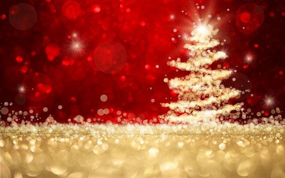 Abstract defocused gold and red glitter christmas tree background with copy space