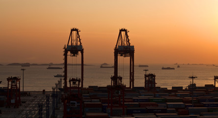 China, Shanghai harber container box. A view of the container terminal in Shanghai (Shanhai). Yangshan, in Hangzhou Bay