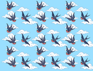 Fototapeta premium Swallows in the sky against the background of the clouds