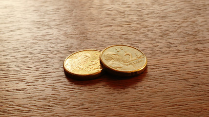 Australia Dollars and Cents Coins on the wooden table