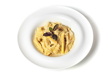Pasta with pear, basil and cream. Isolate on white. Top view