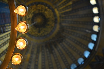 Interior of the mosque. Electric candle lamps.