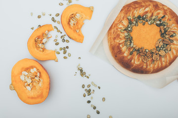 pumkin pie and sliced fresh pumkin