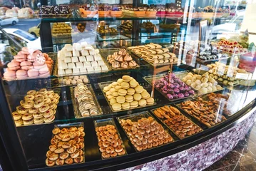 Light filtering roller blinds Dessert Variety of sweets and desserts in a shop