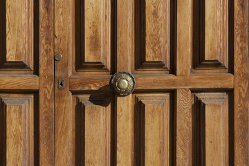 Fototapeta na wymiar Old wooden door with Antique Door Knob