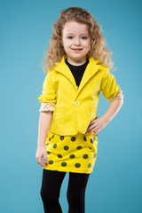Cute young girl dressed all in yellow