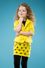 Cute young girl dressed all in yellow