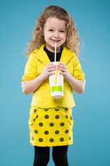 Cute young girl dressed all in yellow