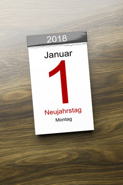 a calendar the 1st of January new year day text in german language